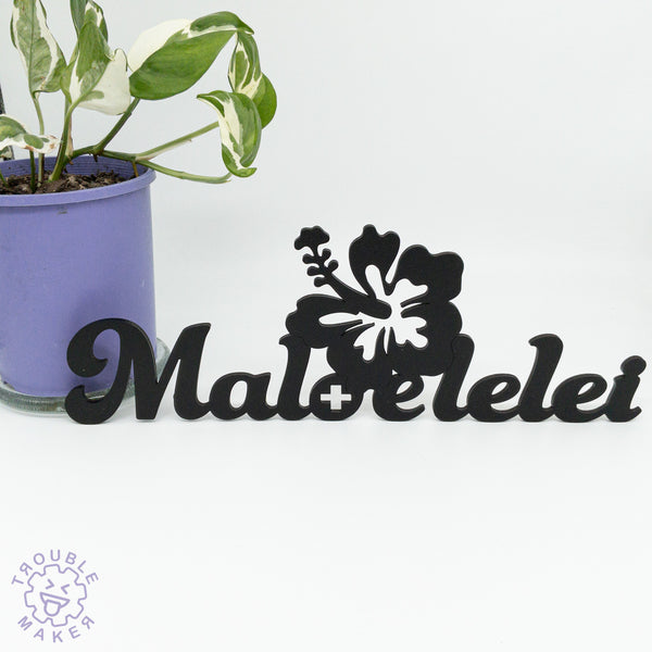 Maloelelei sign art, carved of wood - TroubleMaker.co.nz