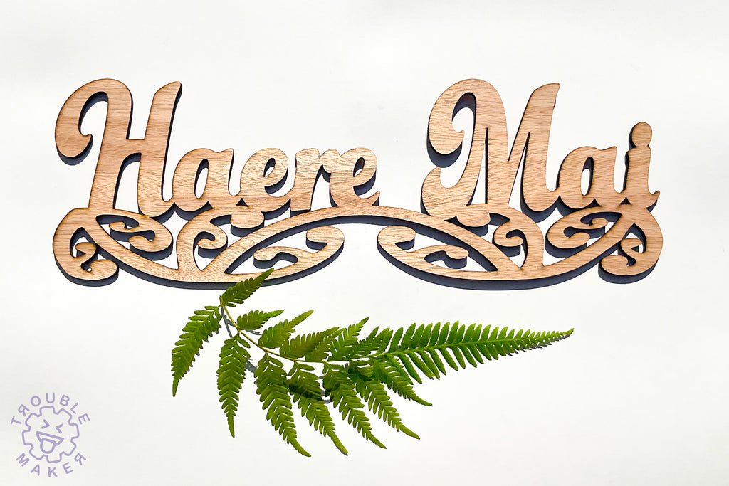 Haere Mai sign art, carved of wood - TroubleMaker.co.nz
