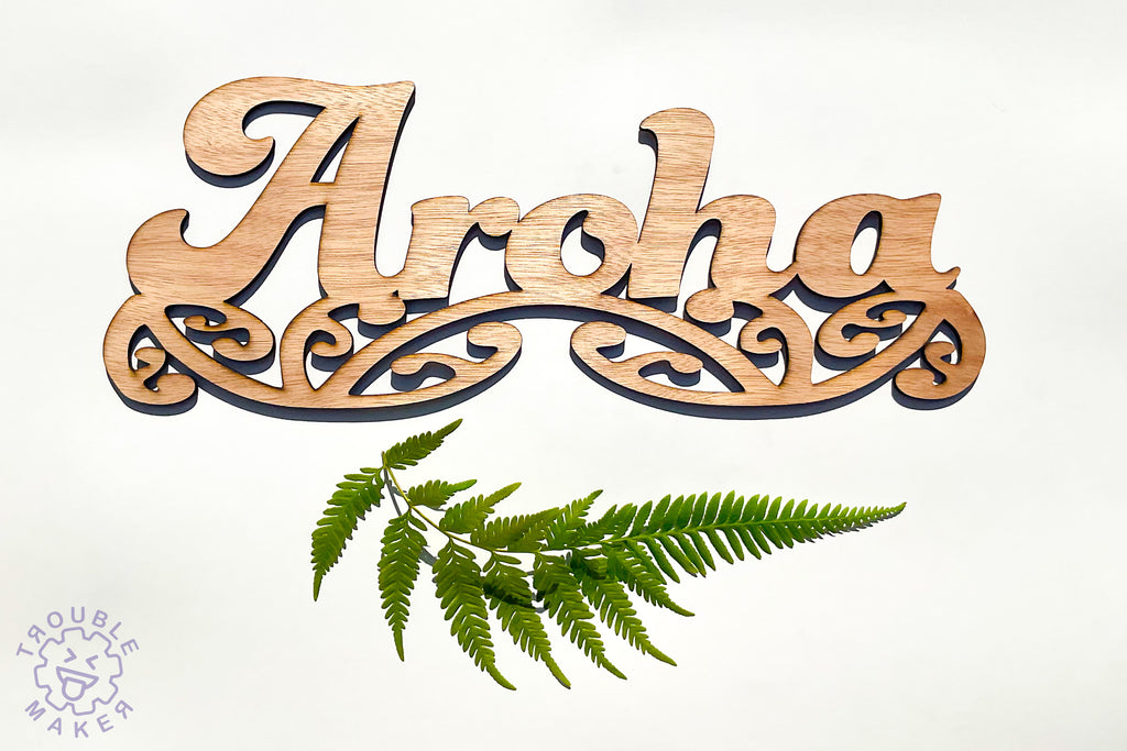Aroha sign art, carved of wood - TroubleMaker.co.nz