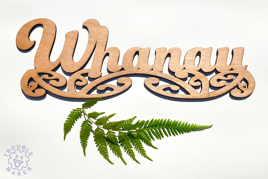 Whanau sign art, carved of wood - TroubleMaker.co.nz