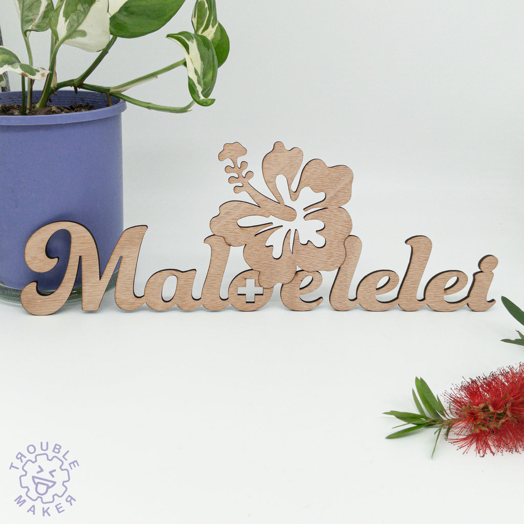 Maloelelei sign art, carved of wood - TroubleMaker.co.nz